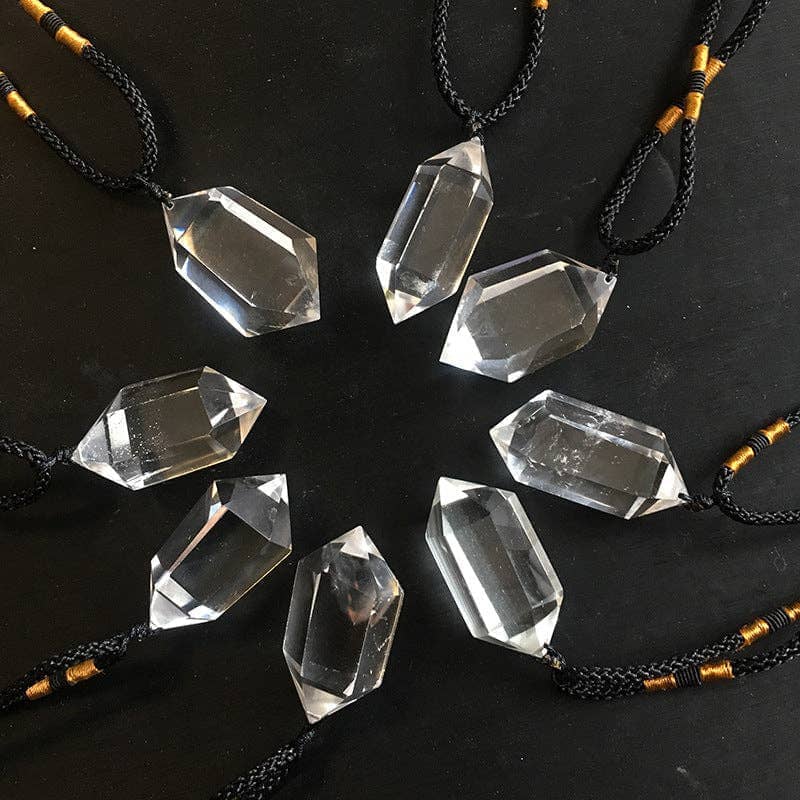 Natural Clear Quartz Crystal Necklace with a unique faceted design and black cord for a stylish look