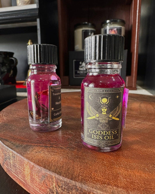 The Crow and Cauldron - 10ml Curio Oil - Isis in a decorative bottle with vibrant purple liquid