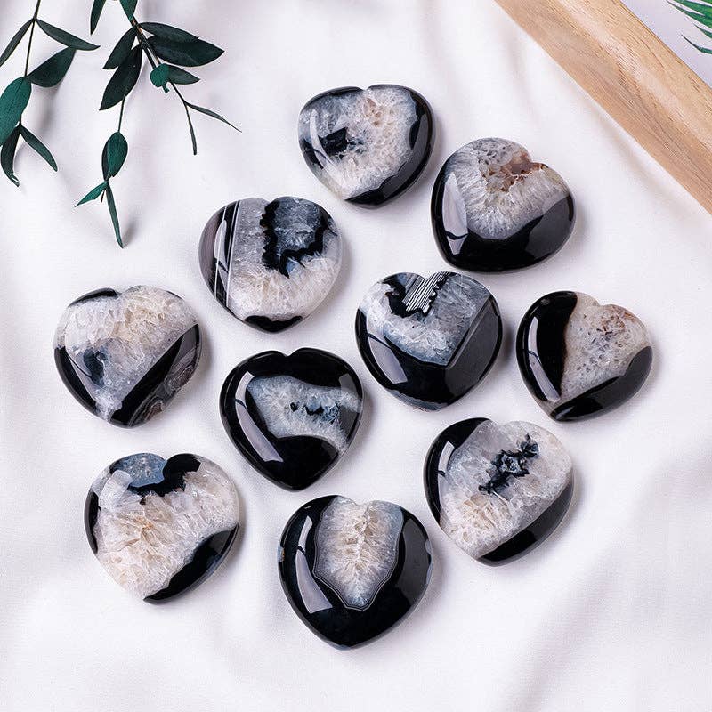 Set of ten Black Agate Heart stones featuring unique patterns for decoration and healing purposes