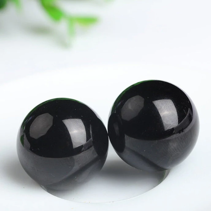 Two polished Black Obsidian Spheres ideal for meditation and energy healing