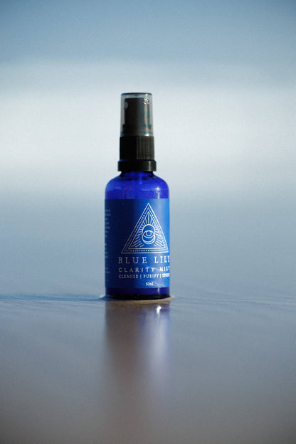 Blue Lily Healing Clarity Mist in a blue bottle for calming and refreshing energy