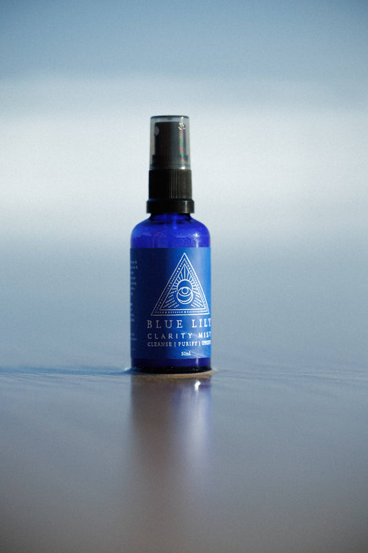 Blue Lily Healing Clarity Mist in a blue bottle for calming and refreshing energy