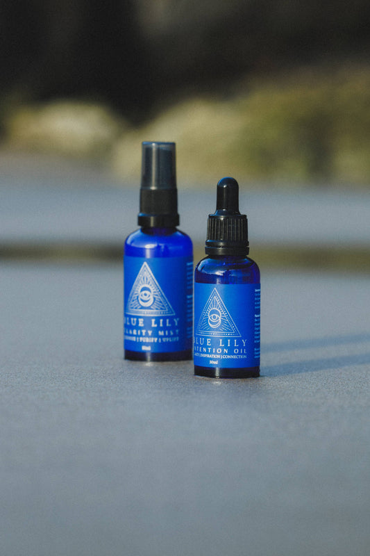 Blue Lily Healing Blue Lotus Intention Oil bottles with a calming blue hue for mindfulness rituals