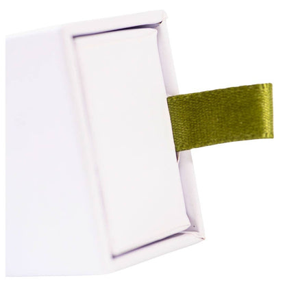 Exuro Incense Sticks box featuring a green ribbon for easy opening and storage