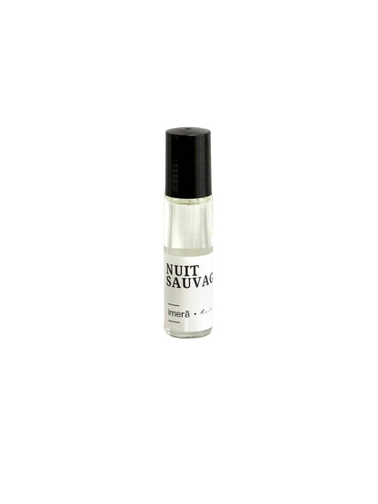 Nuit Savage Perfume Oil in a small roller bottle with a black cap for easy application