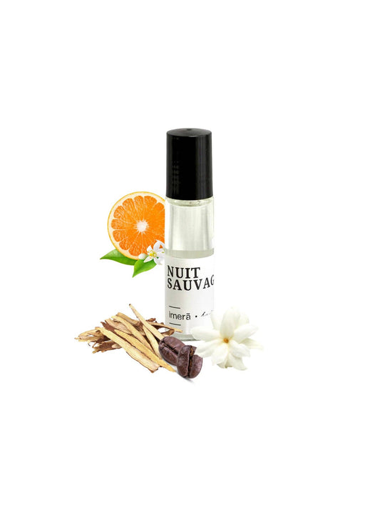 Nuit Savage Perfume Oil in a roll-on bottle with floral and woody notes for a luxurious scent experience