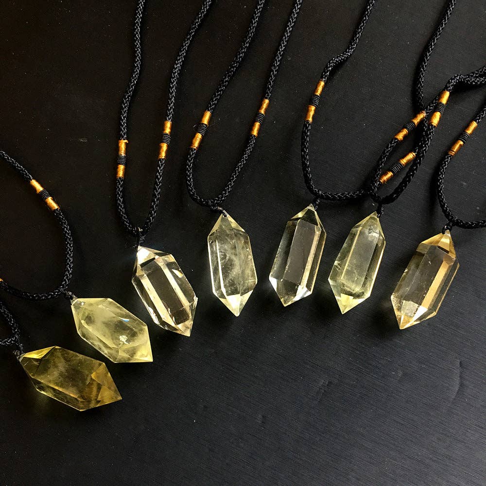 Natural Citrine Crystal Pendant on adjustable black cord with unique shape and golden hue