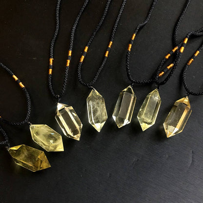 Natural Citrine Crystal Pendant on adjustable black cord with unique shape and golden hue