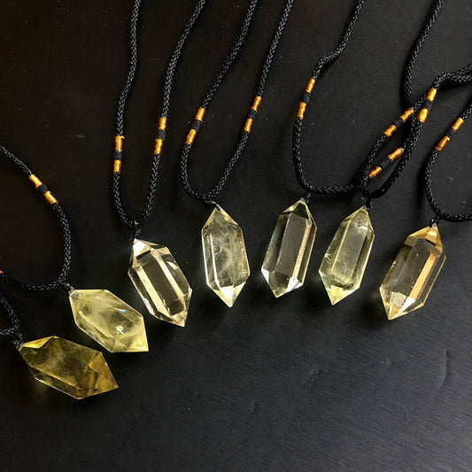 Natural Citrine Crystal Pendant on adjustable black cord with unique shape and golden hue