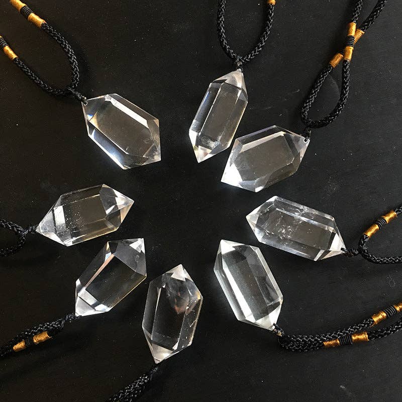 Natural Clear Quartz Crystal Necklace with a unique faceted design and black cord for a stylish look