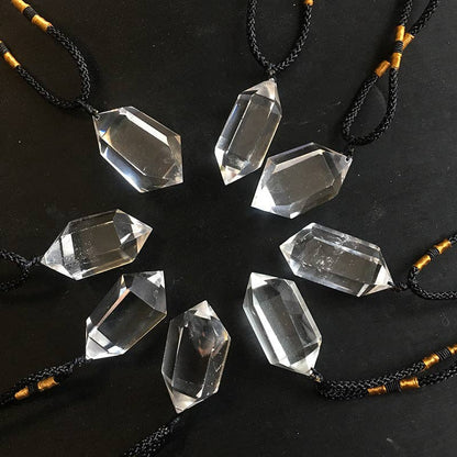 Natural Clear Quartz Crystal Necklace with a unique faceted design and black cord for a stylish look