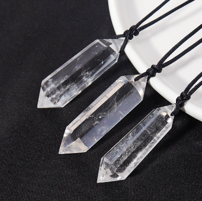 Natural Clear Quartz Crystal Necklace featuring three beautifully shaped crystals on black cords