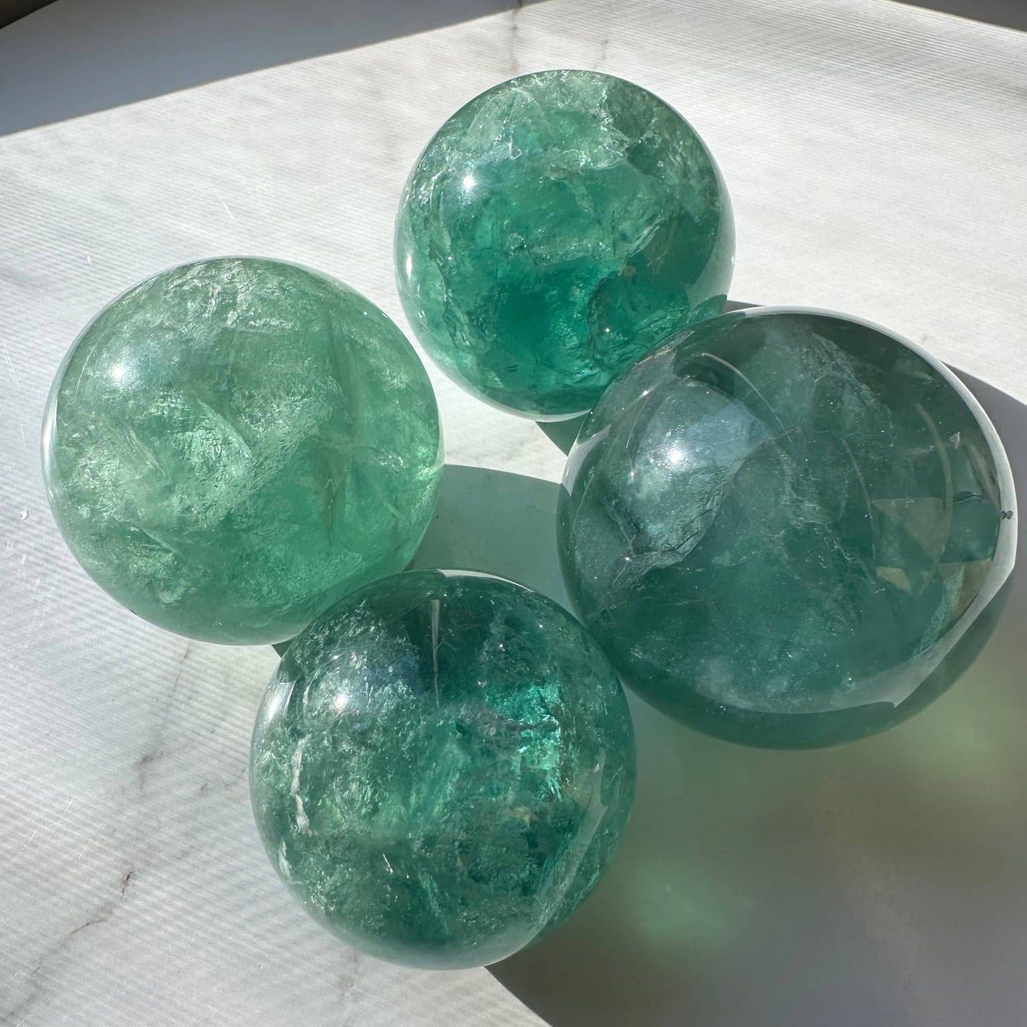 Natural Green Fluorite Sphere Collection with Varied Sizes and Beautiful Transparency