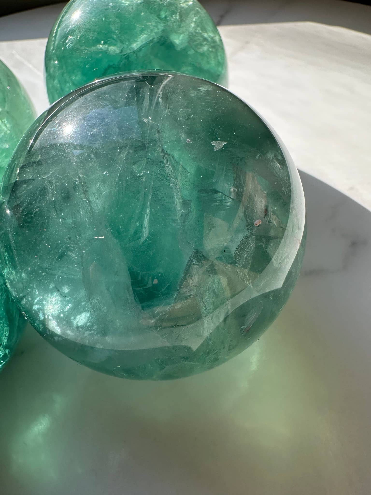 Natural Green Fluorite Sphere with Transparent and Translucent Details for Healing Decor