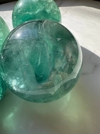 Natural Green Fluorite Sphere with Transparent and Translucent Details for Healing Decor