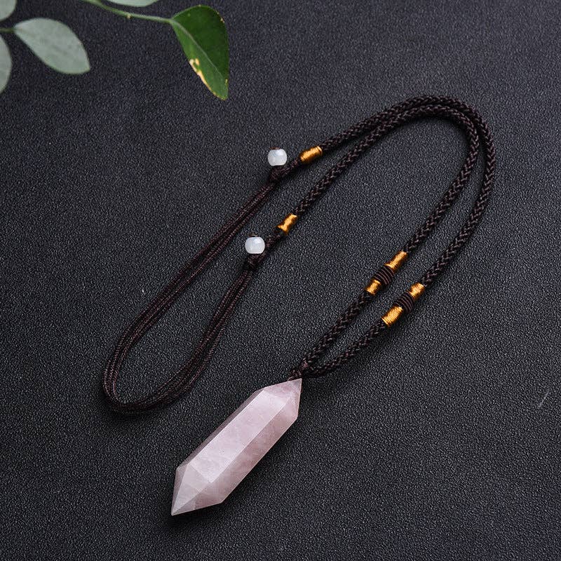 Natural Rose Quartz Pendant on a braided cord with decorative beads for spiritual healing