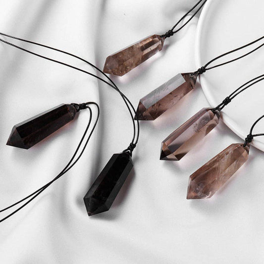 Collection of Smoky Quartz Pendants on black cords, perfect for crystal enthusiasts and jewelry lovers