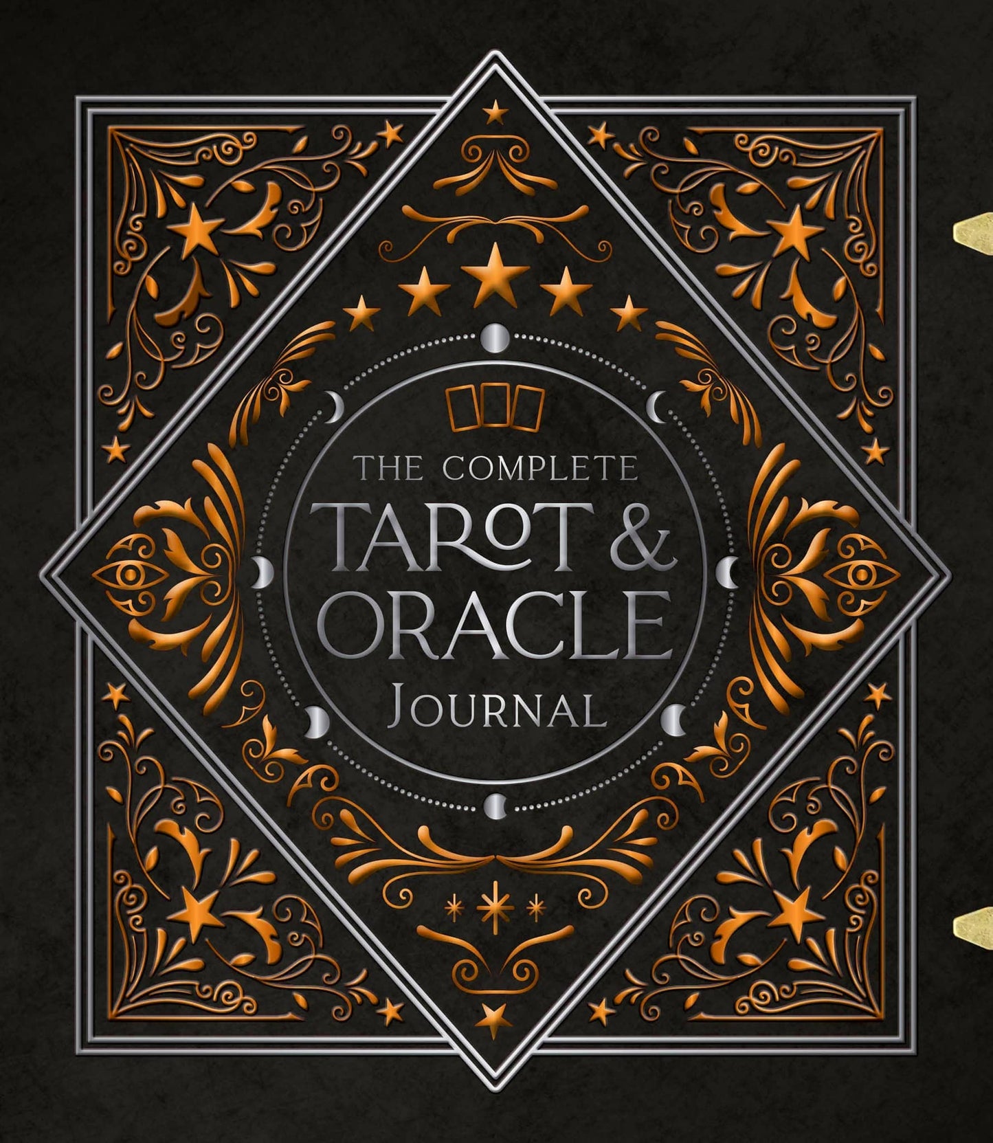 The Complete Tarot & Oracle Journal with ornate cover design featuring stars and moons