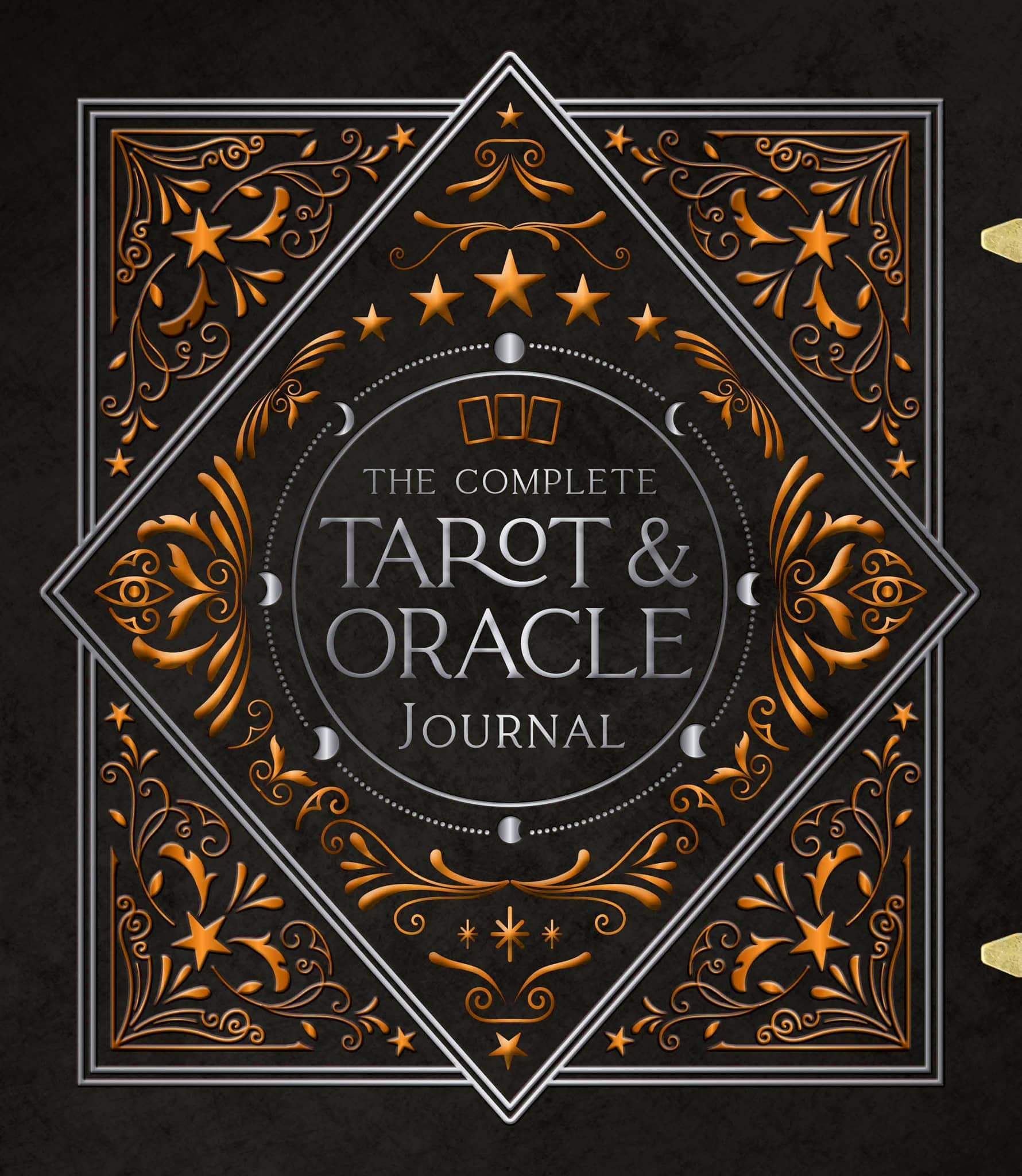 The Complete Tarot & Oracle Journal with ornate cover design featuring stars and moons