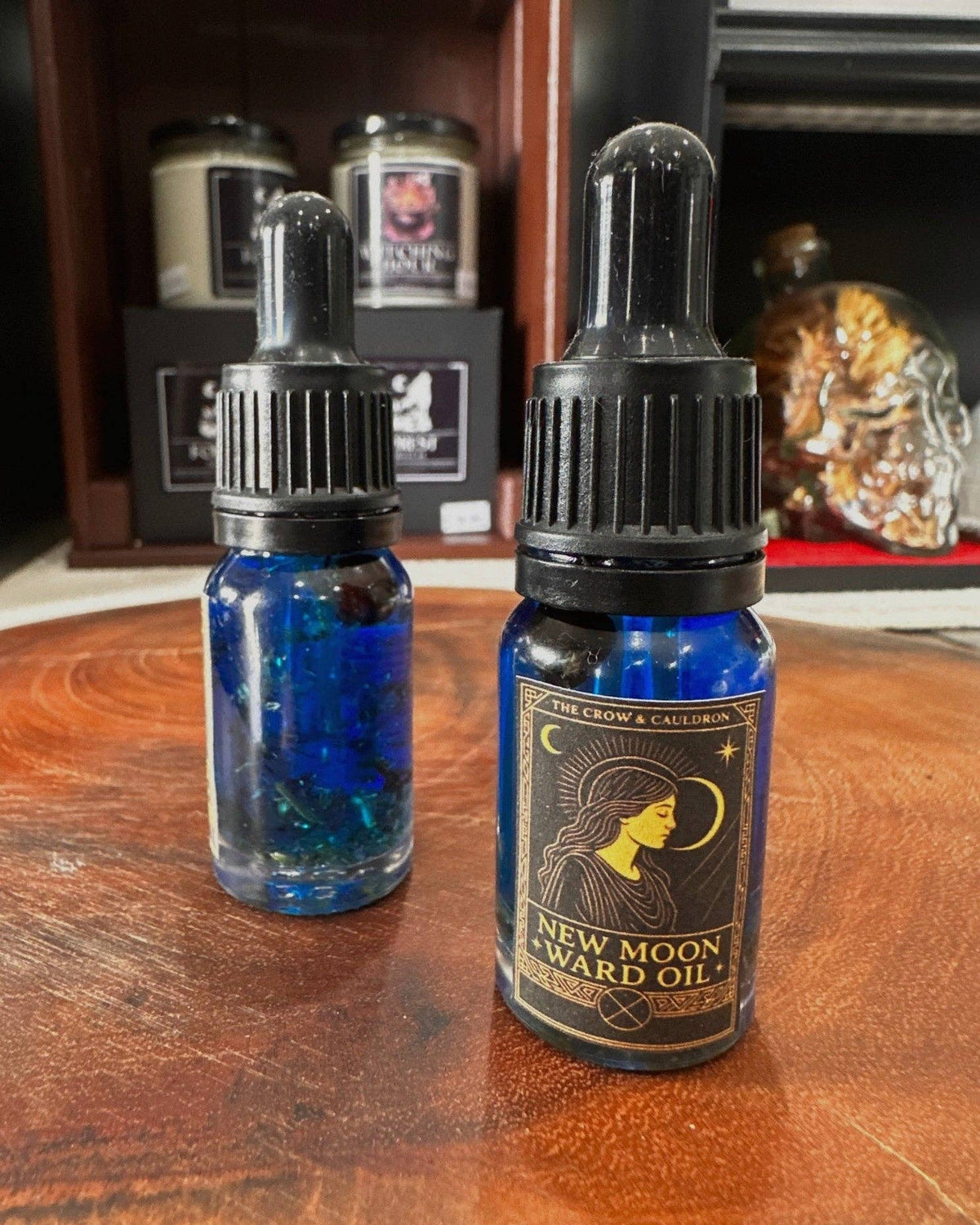 The Crow and Cauldron - 10ml Curio Oil - New Moon in a glass bottle with blue colour and dropper for magical rituals