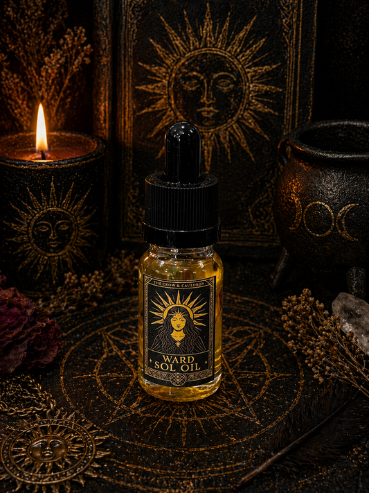 The Crow and Cauldron - 10ml Curio Oil - Ward Sol with a rich golden hue and mystical packaging