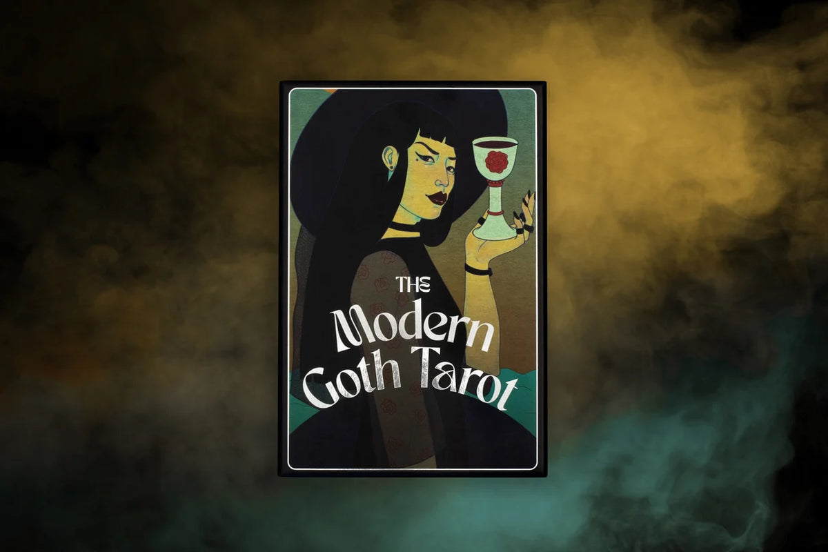 The Modern Goth's Tarot Deck - Nathalie Foss featuring a stylish woman holding a tarot card